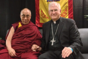 Archbishop Joseph E. Kurtz and His Holiness the Dalai Lama met briefly May 20, 2013, at the KFC Yum! Center. The Dalai Lama plans to visit Louisville again in 2017.