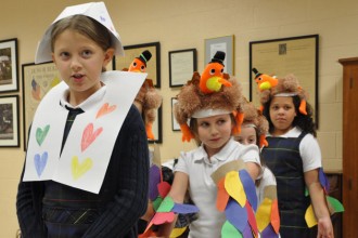 St. Leonard School third-graders performed a reenactment of the first Thanksgiving feast Nov. 20. The third-graders hosted their senior prayer partners for a Thanksgiving celebration. (Record Photos by Jessica Able)