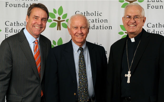 Daniel C. Ulmer Jr., center, and his family have made a $500,000 gift to the Catholic Education Foundation. He is pictured with the foundation president, Richard A. Lechleiter, left, and Archbishop Joseph E. Kurtz. (Photo Special to The Record)