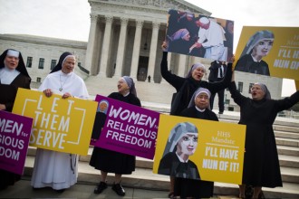 Women religious lobby against the Affordable Care Act's contraceptive mandate March 23 on the steps of the U.S. Supreme Court ahead of oral arguments in Zubik v. Burwell in Washington. (CNS photo/Jim Lo Scalzo, EPA)