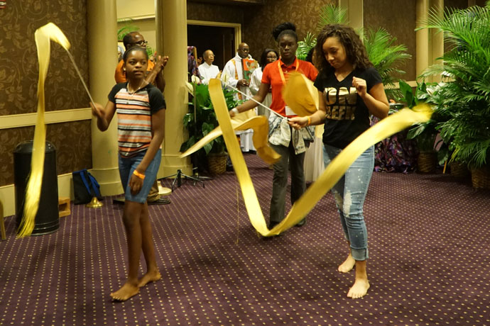 Young Catholics took part in a procession during the opening Mass of the Interregional African American Catholic Evangelization Conference June 10 at the Galt House Hotel. They were among more than 500 who attended the conference from 10 dioceses. (Record Photo by Ruby Thomas)