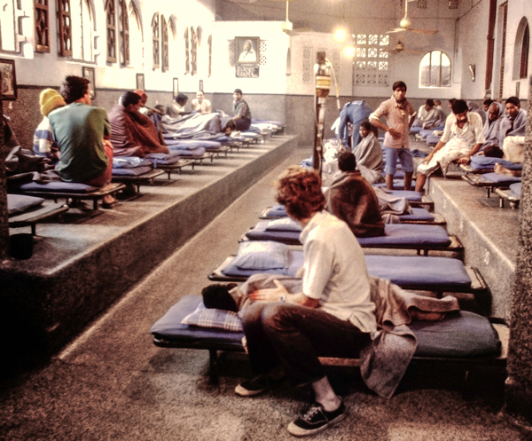 Father Patrick Delahanty captured this image of patients and volunteers during a quiet morning in Blessed TeresaÕs home for the dying in Kalighat, a neighborhood of Kolkata, India, on Dec. 7, 1981.