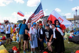 Members of the Circle of Life group — a youth ministry program of St. Luke, St. Rita and St. Athanasius churches — are shown at Campus Misericordiae, the Field of Mercy in Krakow, Poland, where Pope Francis held a prayer vigil and celebrated the closing Mass for World Youth Day 2016 on July 30 and 31. (Photo Special to The Record)