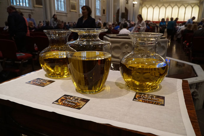 Archbishop Joseph E. Kurtz blessed the oil of the sick and the oil of the catechumens and consecrated the sacred chrism at the annual Chrism Mass April 11 at the Cathedral of the Assumption. (Record Photos by Jessica Able)