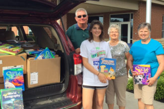 Natalie Williams is pictured with her grandfather Tom Steller, from left, Gail Ashlock of St. James School and her grandmother Janet Steller. (Photo Special to The Record)