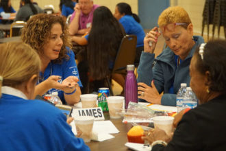 A group of parishioners from St. James Church in Elizabethtown, Ky., took part in a small-group activity at the archdiocesan Encuentro Sept. 16. (Record Photo by Ruby Thomas)