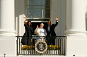 Pope Francis, U.S. President Barack Obama and first lady Michelle wave from the south portico of the White House in Washington Sept. 23. (CNS photo/Paul Haring)