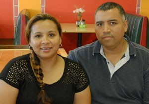 Griselda and Oscar Saucedo, photographed in their bakery La Espiga in Shelbyville, Ky., have been members of Annunciation Church for 20 years. Record Photo by Ruby Thomas
