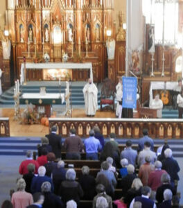 Parishioners attend Mass to celebrate St. Joseph's 150th anniversary. Record Photo by Ruby Thomas 