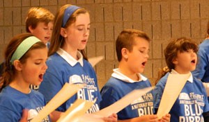 Members of the choir sang during a Mass celebrating St. Albert the Great's feast day. Record Photo by Ruby Thomas