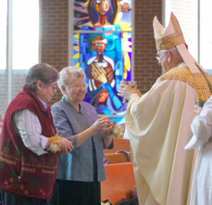 Religious sisters took part in the Mass as gift bearers. (Record Photo by Ruby Thomas)
