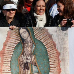 Women stood near an image of Our Lady of Guadalupe during  Pope Francis’ visit to Morelia, Mexico, in February. (CNS photo by Paul Haring)
