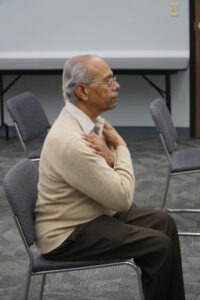 Deacon Joseph Chathaparampil, a permanent deacon of St. James Church in Elizabethtown, Ky., leads a tai chi class at Hardin County Public Library Feb. 22. (Record Photo by Jessica Able)