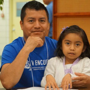 Eduardo Matias, a member of Church of the Annunciation in Shelbyville, Ky., and his 4-year-old daughter Jade Matias Beletzuy were among those who attended the archdiocesan ‘Encuentro’ Sept. 16 at the Flaget Center, 1935 Lewiston Drive. (Record Photo by Ruby Thomas)
