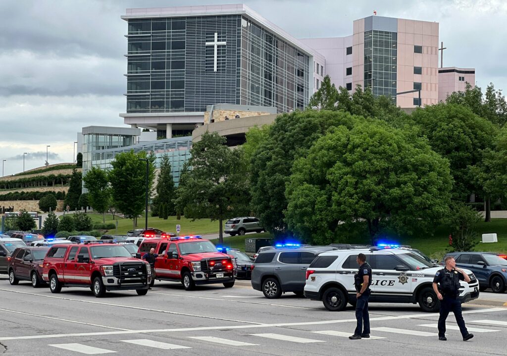 Gunman kills four, then himself <br />at Catholic hospital complex
